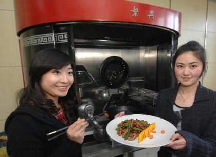 Girls tasting Food by Cooking Robot